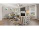 Inviting living room with a fireplace, TV, and comfortable seating arrangement at 1125 Elowen Dr, Austell, GA 30168