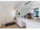 Spacious bathroom with double sinks, a jacuzzi tub, and ample counter space at 1956 Spencer Oaks Ln, Lithonia, GA 30058