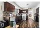 Functional kitchen featuring wood cabinets, tile backsplash, and modern appliances at 1956 Spencer Oaks Ln, Lithonia, GA 30058