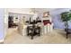 Comfortable living room with a fireplace, carpeted floors, and natural lighting at 1956 Spencer Oaks Ln, Lithonia, GA 30058
