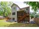 Back exterior with a screened porch, wooden deck, and access to the backyard at 2370 Burch Cir, Brookhaven, GA 30319