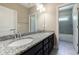 Bathroom featuring double granite vanity with views of tub and shower at 2370 Burch Cir, Brookhaven, GA 30319