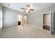 Spacious bedroom featuring a ceiling fan and ensuite bathroom access at 2370 Burch Cir, Brookhaven, GA 30319