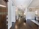 Elegant foyer with hardwood floors and an open view into the adjacent dining and living spaces at 2370 Burch Cir, Brookhaven, GA 30319