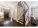 Foyer with hardwood floors, staircase and views to the front door and living room at 2370 Burch Cir, Brookhaven, GA 30319