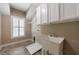 Laundry room with sink, cabinets, and closet at 2370 Burch Cir, Brookhaven, GA 30319