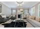 Inviting living room showcases a fireplace, comfortable seating, and ample natural light at 2370 Burch Cir, Brookhaven, GA 30319