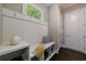 Mudroom features custom built-in bench with coat hooks, shelf, and abundant storage at 2370 Burch Cir, Brookhaven, GA 30319