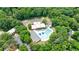 Bird's eye view of a beautiful community pool surrounded by leafy green trees at 2370 Burch Cir, Brookhaven, GA 30319
