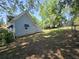Fenced backyard with a trampoline and partial views of the home at 5108 Hackett Ne St, Covington, GA 30014
