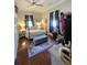 Comfortable bedroom with four-poster bed, soft lighting, and a stylish area rug at 5108 Hackett Ne St, Covington, GA 30014