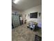 Cozy dining area features a vintage cabinet, stainless refrigerator, and a unique decorative chalkboard at 5108 Hackett Ne St, Covington, GA 30014