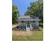 Charming single-story home with a quaint front porch with plants, inviting curb appeal and a lovely garden area at 5108 Hackett Ne St, Covington, GA 30014