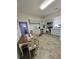 Eat-in kitchen featuring stainless steel appliances, updated cabinets, and a dining area with seating for six at 5108 Hackett Ne St, Covington, GA 30014