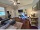 Inviting living room showcasing hardwood floors, stylish furnishings, and ample natural light at 5108 Hackett Ne St, Covington, GA 30014