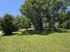 This property features a well-maintained front yard, mature trees, and a charming home at 5108 Hackett Ne St, Covington, GA 30014