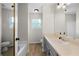 Bright bathroom featuring modern fixtures, a tub, and a neutral color scheme at 71 Headland Ct, Rockmart, GA 30153