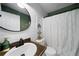 Modern bathroom with a vanity, neutral walls, and a shower with a curtain at 71 Headland Ct, Rockmart, GA 30153