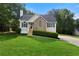 Charming home features a well-manicured lawn, stone accents, and a cozy entrance at 71 Headland Ct, Rockmart, GA 30153