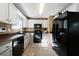 Kitchen features modern appliances, white cabinets, and sleek countertops at 71 Headland Ct, Rockmart, GA 30153