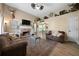 Inviting living room features a stone fireplace, vaulted ceiling, and comfortable seating at 71 Headland Ct, Rockmart, GA 30153