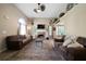 Spacious living room features a stone fireplace and an open layout at 71 Headland Ct, Rockmart, GA 30153