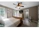 Spacious main bedroom features a ceiling fan, natural light, and neutral-toned walls at 71 Headland Ct, Rockmart, GA 30153