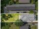 An overhead shot highlights the yard and house surrounded by trees at 918 Washington Sw St, Atlanta, GA 30315