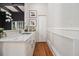 Chic bar area with marble countertops, custom cabinets, and modern finishes at 918 Washington Sw St, Atlanta, GA 30315