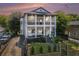 Charming two-story home with a double-decker porch and well-manicured front yard at 918 Washington Sw St, Atlanta, GA 30315