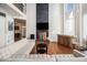 Bright living room with soaring ceilings, modern fireplace, and comfortable seating arrangement at 918 Washington Sw St, Atlanta, GA 30315