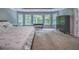 Main bedroom featuring a bay window with views of nature at 1325 Starboard Way, Cumming, GA 30041
