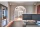 Office space featuring hardwood floors and an arched doorway leading to the dining area at 1325 Starboard Way, Cumming, GA 30041