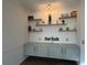 Living area showcasing custom shelving, decorative wall accents, and built-in cabinets at 2610 Stokesley Way, Snellville, GA 30078