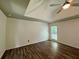 Spacious main bedroom featuring luxury vinyl plank flooring and a ceiling fan at 2610 Stokesley Way, Snellville, GA 30078