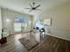 Home office featuring natural light, modern decor, and hardwood floors, perfect for productivity at 2610 Stokesley Way, Snellville, GA 30078