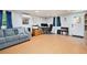 Finished basement featuring a relaxation area, a work area, and lots of light at 4840 Chapel Hill Rd, Douglasville, GA 30135