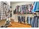 Walk-in closet with hanging racks and shelving, offering ample storage space at 4840 Chapel Hill Rd, Douglasville, GA 30135