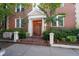Elegant brick building entrance with double doors, decorative trim and manicured landscaping at 733 Frederica Ne St # 17, Atlanta, GA 30306