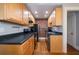 Efficient kitchen featuring stainless appliances and black countertops at 733 Frederica Ne St # 17, Atlanta, GA 30306