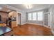 Bright living room featuring hardwood floors and an open layout to the kitchen at 733 Frederica Ne St # 17, Atlanta, GA 30306