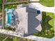 Aerial view of a home with a private pool, a patio area, and lush green surroundings at 771 Phil Haven Ln, Kennesaw, GA 30152