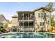Two story screened porch overlooking the pool, with stairs leading to the yard at 771 Phil Haven Ln, Kennesaw, GA 30152