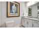 Bathroom vanity with granite countertops and neutral finishes at 771 Phil Haven Ln, Kennesaw, GA 30152
