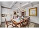 Bright dining room featuring decorative moldings and cabinetry for ample storage at 771 Phil Haven Ln, Kennesaw, GA 30152