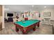 Game room featuring a pool table, media area, and a bar table with bar stools at 771 Phil Haven Ln, Kennesaw, GA 30152