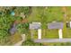 A top-down aerial view of the property shows its layout, driveway, and the surrounding greenery at 14 Connie St, Cartersville, GA 30121