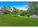 Spacious backyard with a detached garage, offering ample room for outdoor activities and potential expansion at 14 Connie St, Cartersville, GA 30121