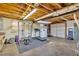 Unfinished basement featuring exercise equipment and a storage area at 14 Connie St, Cartersville, GA 30121
