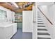 Clean basement with washer, dryer, and open ceiling at 14 Connie St, Cartersville, GA 30121